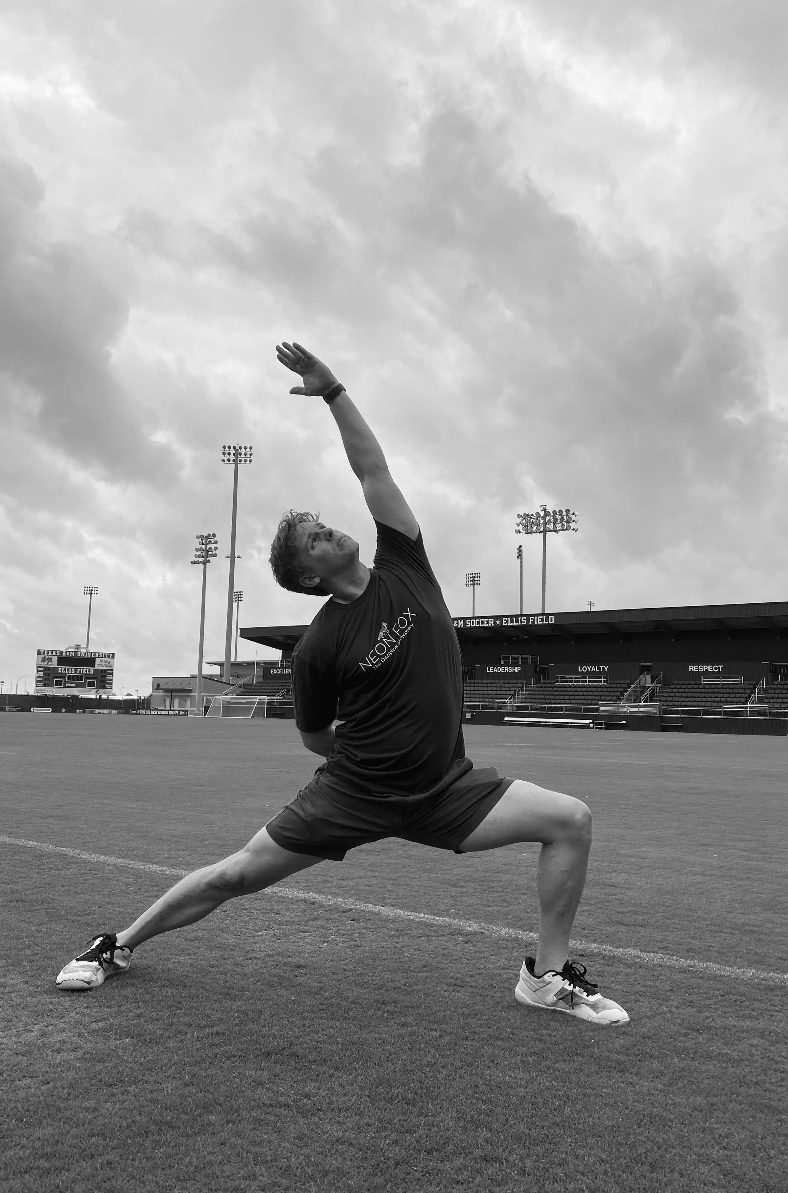Jeff Whitehead in reverse warrior pose at Ellis Field, Texas A&M